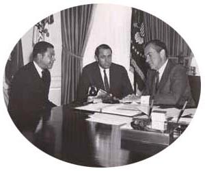 This photograph depicts, from left to right, Richard Nixon, William Lawrence Saltonstall (1927-2009) and Edward Brooks